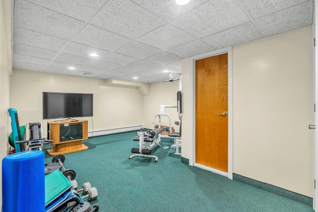8 Victor Ln, Woodbury, NY 11797 - workout area with a baseboard heating unit, carpet flooring, a drop ceiling, recessed lighting, and baseboards