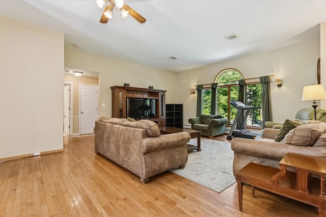312 Diddell Rd, Poughkeepsie, NY 12603 - living area with ceiling fan, light wood-style floors, and baseboards