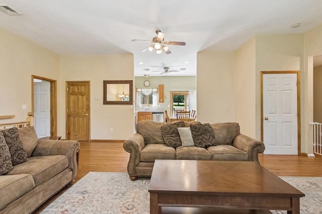 312 Diddell Rd, Poughkeepsie, NY 12603 - living area with ceiling fan, wood finished floors, and baseboards