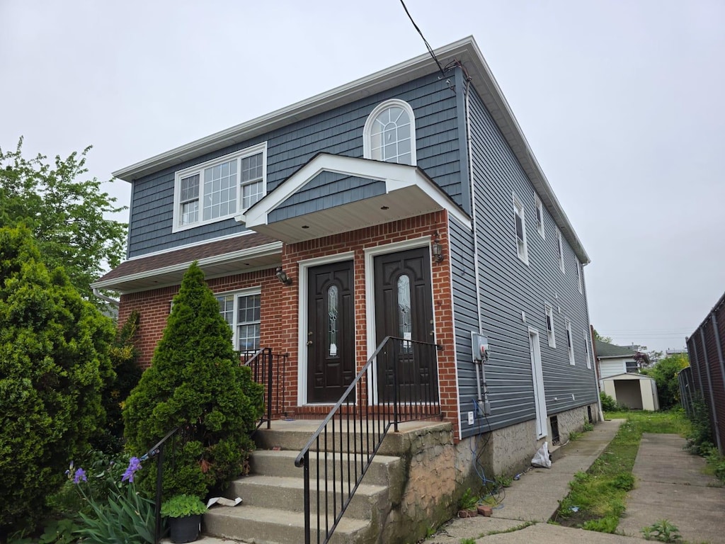 14602 180th St, Springfield Gardens, NY 11434 - view of front facade with brick siding