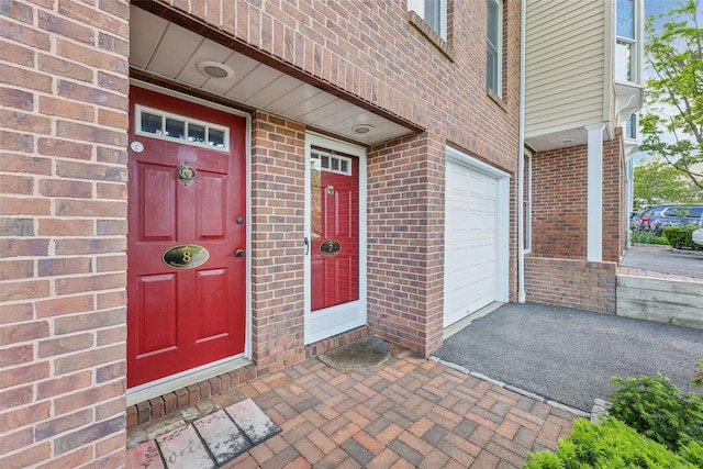 7 Washington Mews Unit 7, Port Chester, NY 10573 - doorway to property featuring brick siding and asphalt driveway