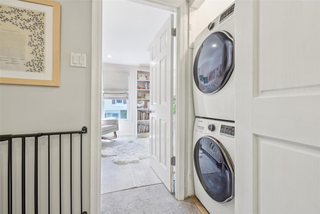 7 Washington Mews Unit 7, Port Chester, NY 10573 - laundry area featuring stacked washing machine and dryer, carpet flooring, and recessed lighting