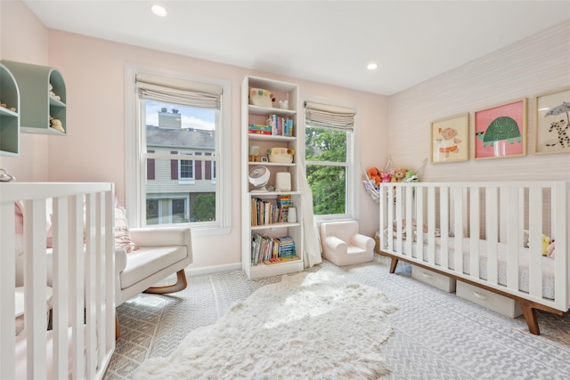 7 Washington Mews Unit 7, Port Chester, NY 10573 - bedroom featuring carpet flooring, a nursery area, and recessed lighting