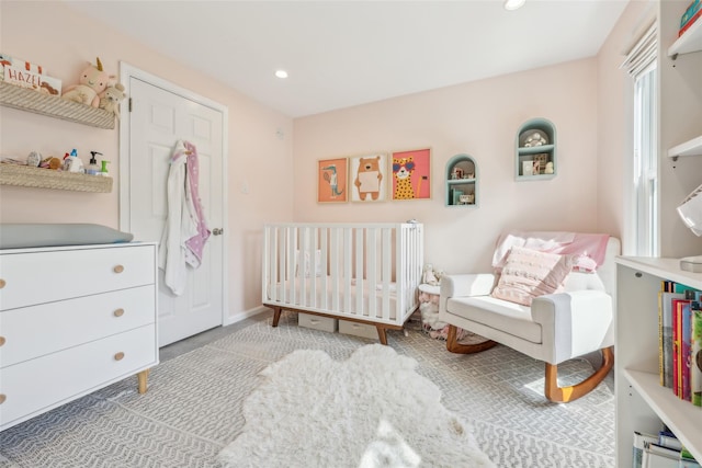 7 Washington Mews Unit 7, Port Chester, NY 10573 - bedroom featuring a crib, recessed lighting, and carpet flooring