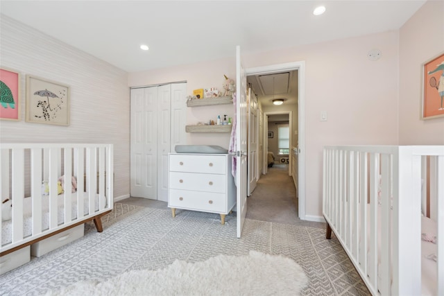 7 Washington Mews Unit 7, Port Chester, NY 10573 - carpeted bedroom with attic access, a closet, recessed lighting, and wallpapered walls