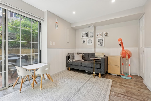 7 Washington Mews Unit 7, Port Chester, NY 10573 - living area with wainscoting, wood finished floors, and recessed lighting
