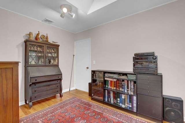 207 N 3rd St, Bethpage, NY 11714 - sitting room with wood finished floors and baseboards