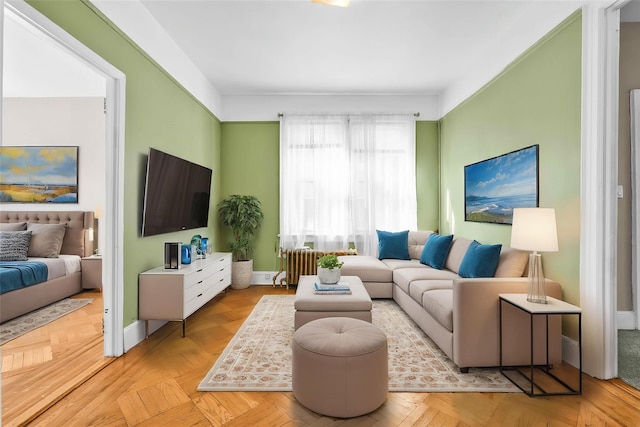 3004 14th St, Astoria, NY 11102 - living room with radiator heating unit and baseboards