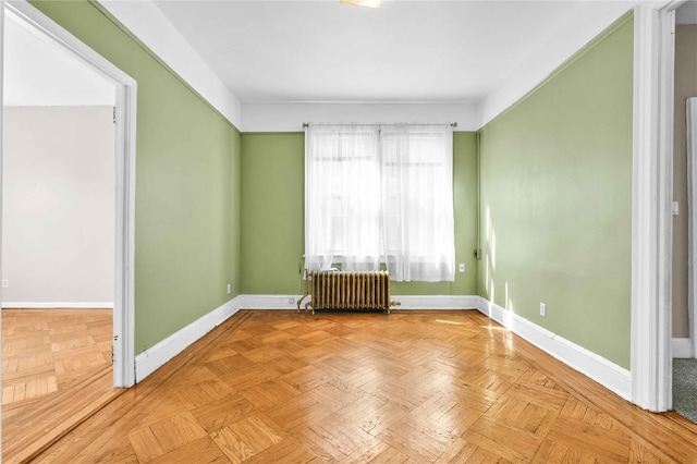 3004 14th St, Astoria, NY 11102 - unfurnished room featuring radiator and baseboards