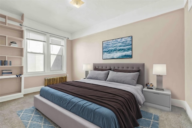 3004 14th St, Astoria, NY 11102 - bedroom featuring radiator heating unit, carpet floors, and baseboards