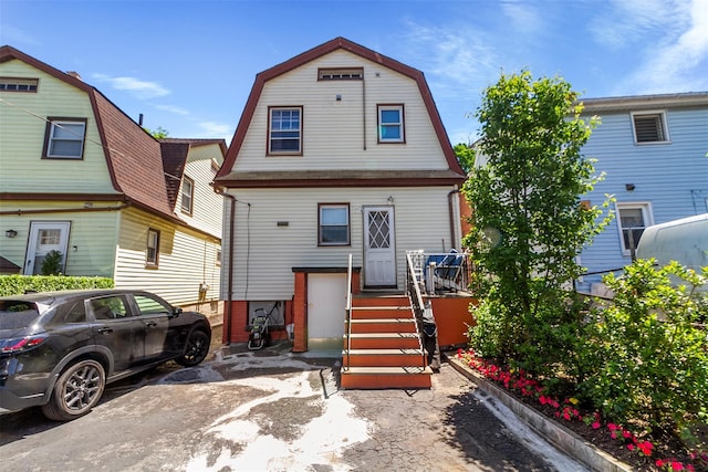 4 Oakley Pl, Mount Vernon, NY 10550 - rear view of property with a gambrel roof