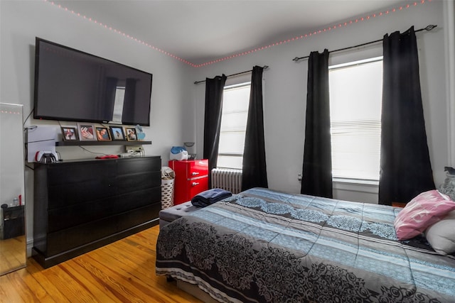 4 Oakley Pl, Mount Vernon, NY 10550 - bedroom featuring radiator and wood finished floors
