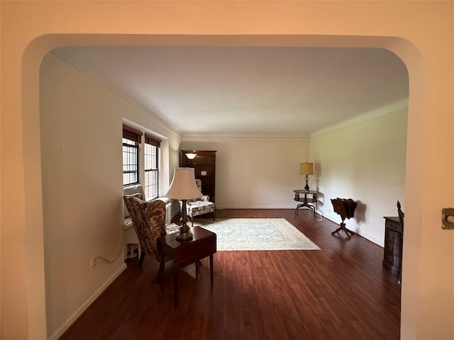 198 Garth Rd Unit 1D, Scarsdale, NY 10583 - living area with dark wood finished floors, baseboards, and arched walkways