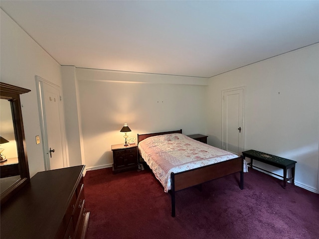 198 Garth Rd Unit 1D, Scarsdale, NY 10583 - bedroom featuring dark colored carpet and baseboards
