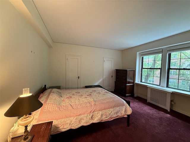 198 Garth Rd Unit 1D, Scarsdale, NY 10583 - bedroom featuring radiator heating unit, carpet floors, and baseboards