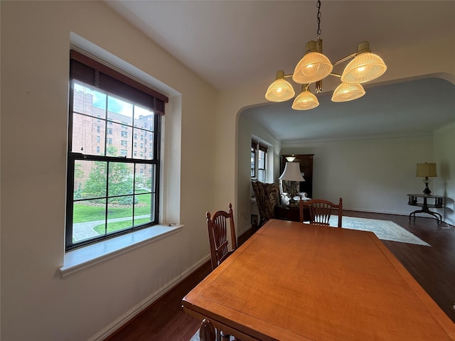 198 Garth Rd Unit 1D, Scarsdale, NY 10583 - dining area featuring arched walkways and plenty of natural light