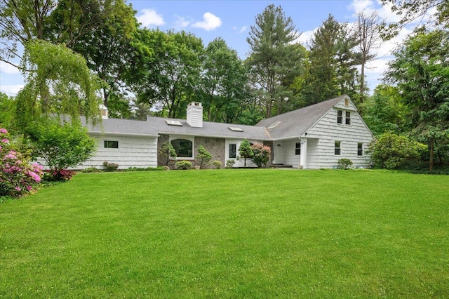 17 Juneau Blvd, Woodbury, NY 11797 - rear view of house featuring a chimney and a lawn