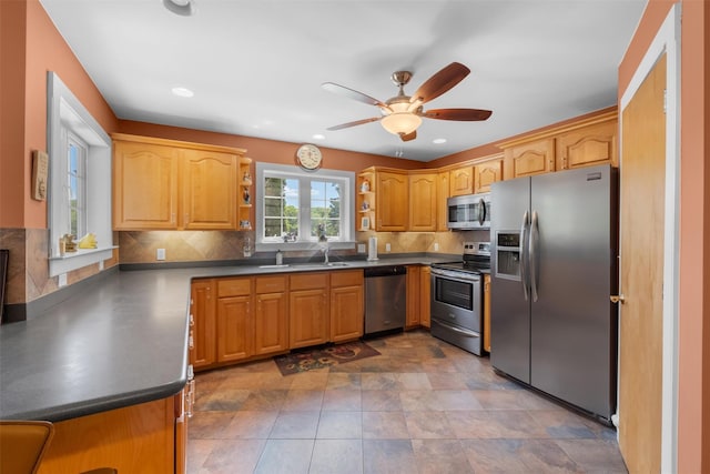 138 Jansen, Holmes, NY 12531 - kitchen featuring appliances with stainless steel finishes, a ceiling fan, decorative backsplash, dark countertops, and recessed lighting