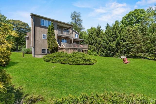 138 Jansen, Holmes, NY 12531 - back of property with a balcony and a yard