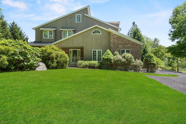 138 Jansen, Holmes, NY 12531 - view of front facade with a front lawn and brick siding