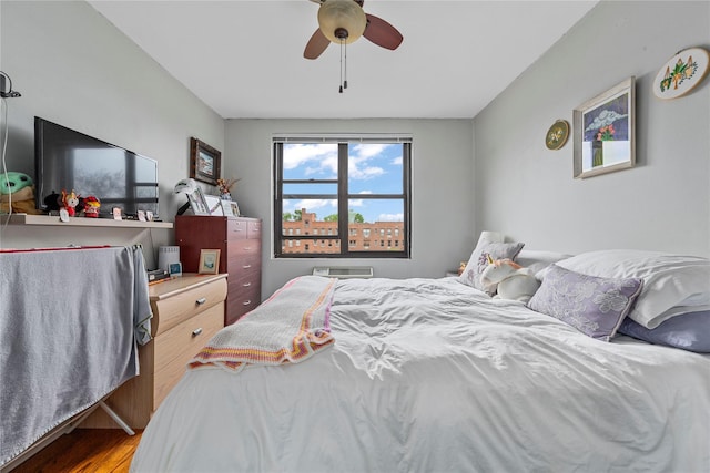 1 Jefferson Ave Unit B12, Rockville Centre, NY 11570 - bedroom with wood finished floors and a ceiling fan