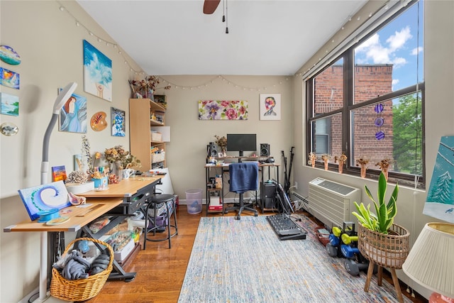 1 Jefferson Ave Unit B12, Rockville Centre, NY 11570 - office area featuring wood finished floors, a ceiling fan, and a wall mounted AC