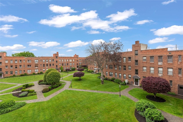 1 Jefferson Ave Unit B12, Rockville Centre, NY 11570 - view of property's community featuring a lawn
