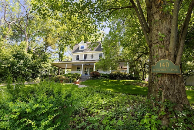 140 Montgomery Cir, New Rochelle, NY 10804 - view of front facade featuring a front yard and a porch