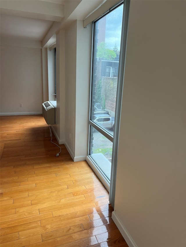139-30 34th Ave Unit 3B, Flushing, NY 11355 - hallway featuring plenty of natural light and light wood-style floors