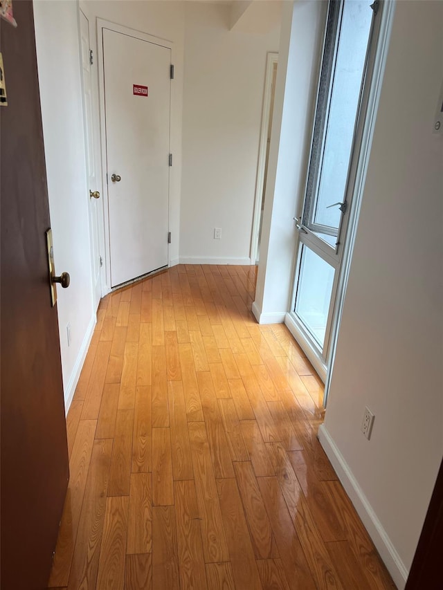 139-30 34th Ave Unit 3B, Flushing, NY 11355 - hallway with light wood-style floors and baseboards