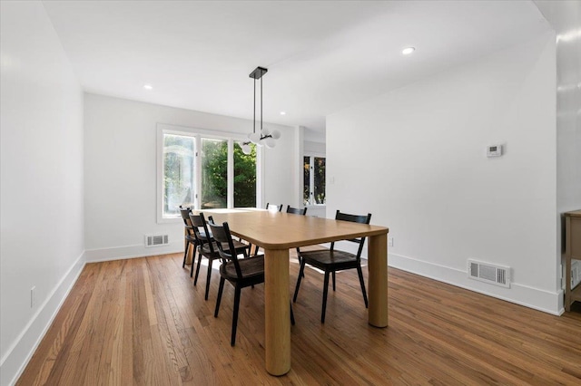 311 Hungry Harbor Rd, North Woodmere, NY 11581 - dining area featuring wood finished floors, baseboards, and recessed lighting