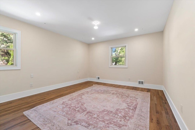 311 Hungry Harbor Rd, North Woodmere, NY 11581 - unfurnished room featuring wood finished floors, baseboards, and recessed lighting