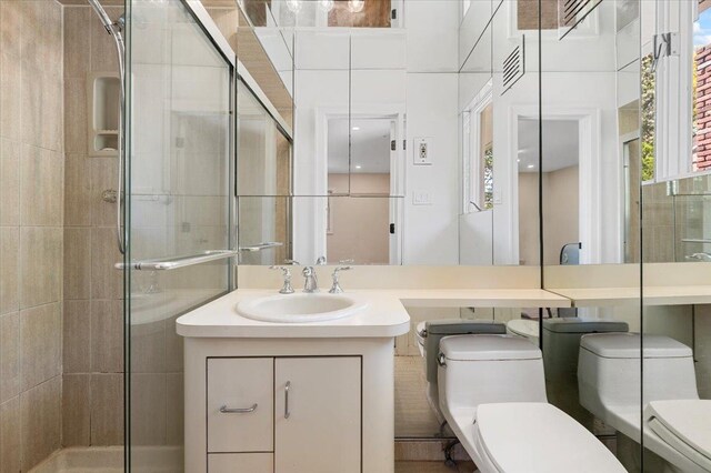 311 Hungry Harbor Rd, North Woodmere, NY 11581 - bathroom with toilet, a stall shower, and vanity