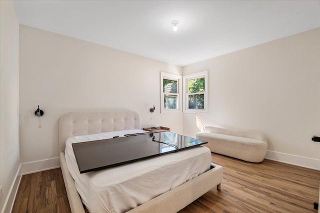 311 Hungry Harbor Rd, North Woodmere, NY 11581 - bedroom featuring wood finished floors and baseboards
