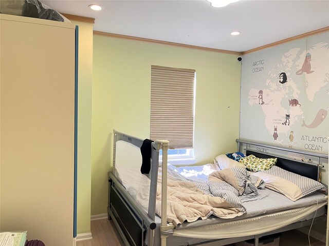 167-11 Powells Cove Blvd Unit 27, Beechhurst, NY 11357 - bedroom featuring ornamental molding, recessed lighting, wood finished floors, and baseboards