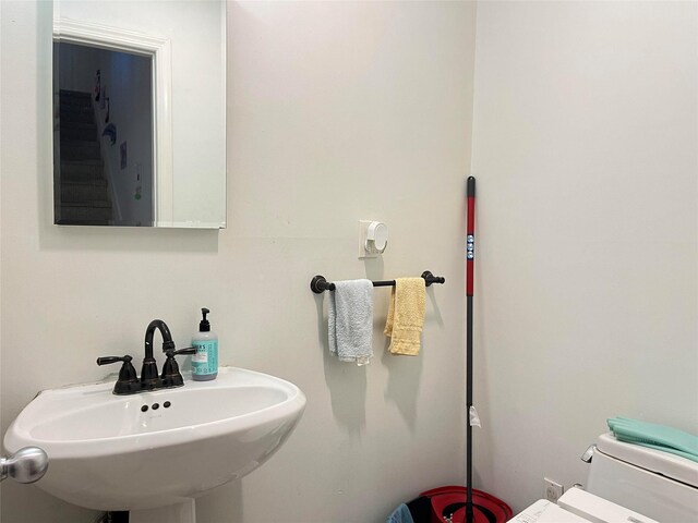 167-11 Powells Cove Blvd Unit 27, Beechhurst, NY 11357 - half bath with a sink and toilet