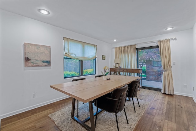 291 Starling Ct, Manhasset, NY 11030 - dining area with plenty of natural light, baseboards, wood finished floors, and recessed lighting