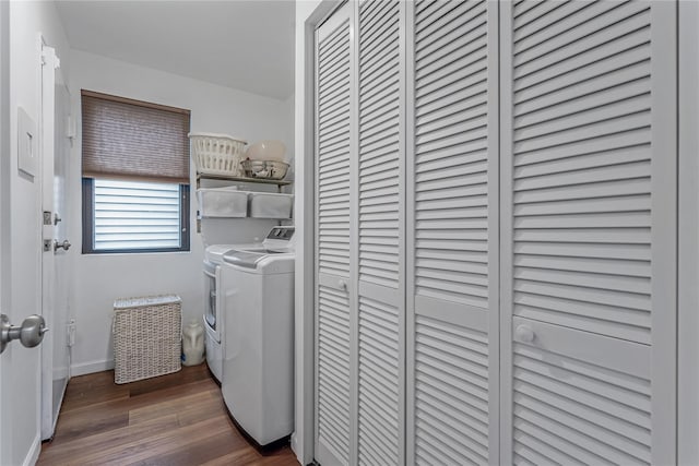 291 Starling Ct, Manhasset, NY 11030 - laundry area featuring washer and dryer, dark wood-style floors, and baseboards
