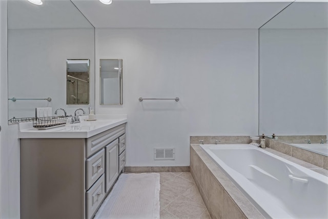291 Starling Ct, Manhasset, NY 11030 - full bath with vanity, a bath, tile patterned floors, and an enclosed shower