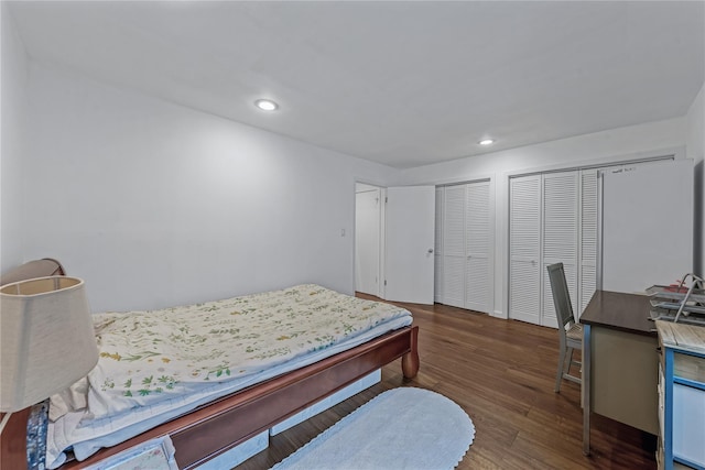 291 Starling Ct, Manhasset, NY 11030 - bedroom featuring multiple closets, wood finished floors, and recessed lighting
