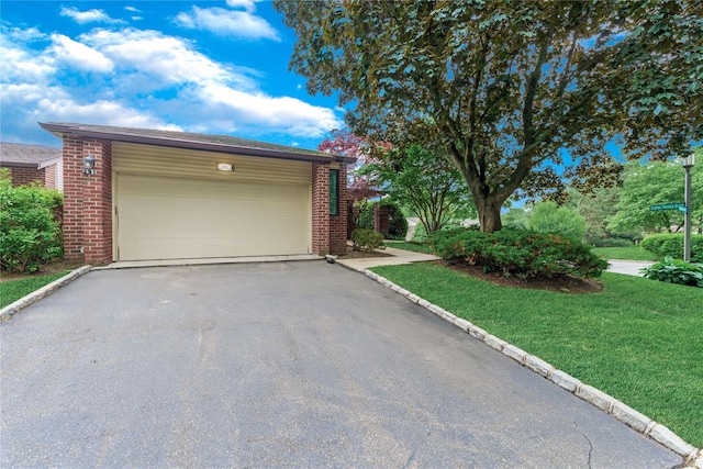 291 Starling Ct, Manhasset, NY 11030 - garage with asphalt driveway