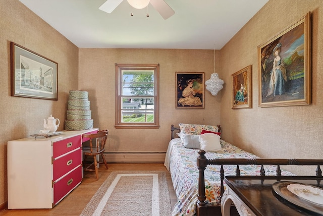 35 Old Farms Rd, Poughkeepsie, NY 12603 - bedroom featuring a baseboard radiator, light wood-type flooring, and a ceiling fan
