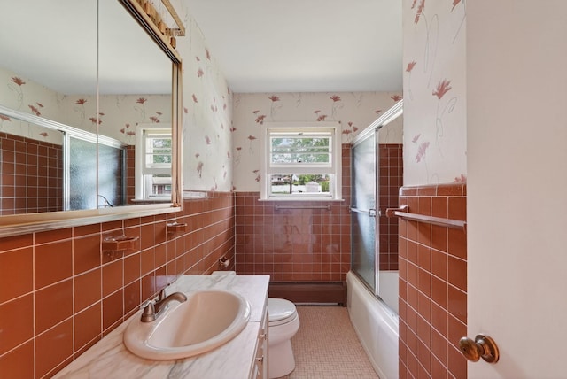 35 Old Farms Rd, Poughkeepsie, NY 12603 - full bathroom with tile walls, wallpapered walls, vanity, enclosed tub / shower combo, and a wainscoted wall