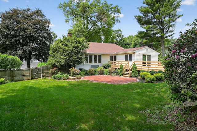 35 Old Farms Rd, Poughkeepsie, NY 12603 - rear view of house with a deck and a chimney