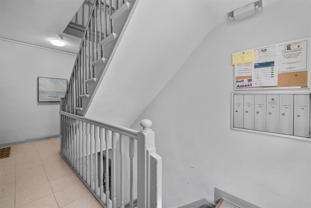 4 Leewood Cir Unit 4L, Eastchester, NY 10709 - stairway with vaulted ceiling and tile patterned flooring