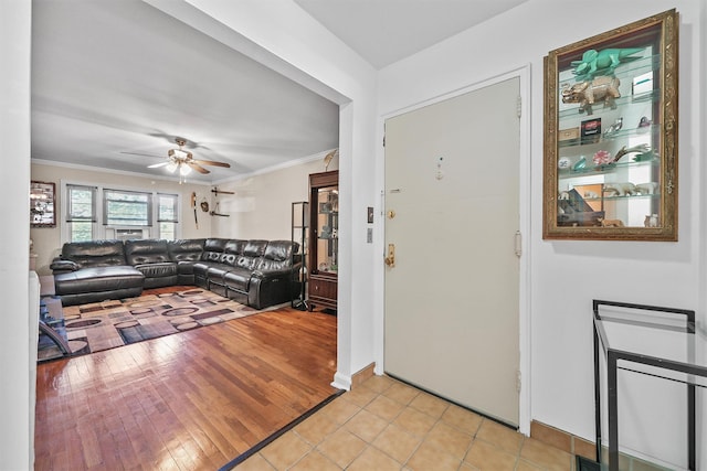 4 Leewood Cir Unit 4L, Eastchester, NY 10709 - living room with crown molding, ceiling fan, light wood-type flooring, and baseboards