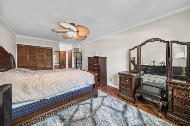 4 Leewood Cir Unit 4L, Eastchester, NY 10709 - bedroom with wood finished floors, crown molding, baseboards, ceiling fan, and a closet