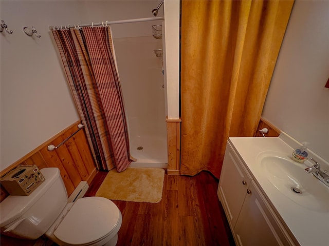 110 Lake Muskoday Rd, Roscoe, NY 12736 - full bath featuring wood finished floors, toilet, a shower stall, vanity, and a wainscoted wall