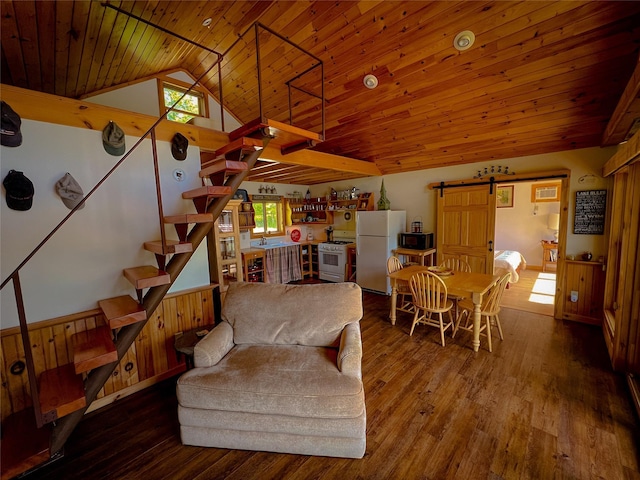 110 Lake Muskoday Rd, Roscoe, NY 12736 - living area with a barn door, stairway, wooden ceiling, lofted ceiling, and wood finished floors