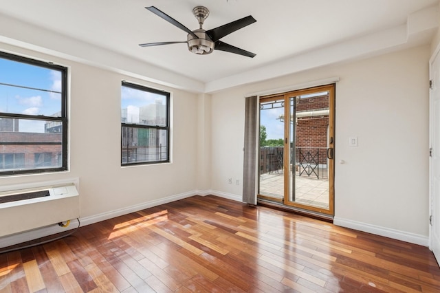 71-19 162nd St Unit 4E, Fresh Meadows, NY 11365 - spare room featuring hardwood / wood-style floors, baseboards, and ceiling fan
